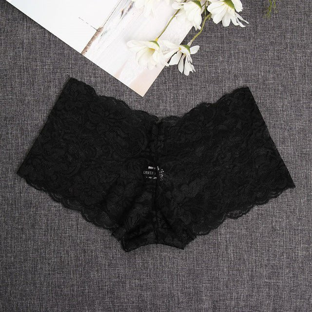 Black high-waist thong with lace trim, designed for a sophisticated and sensual look