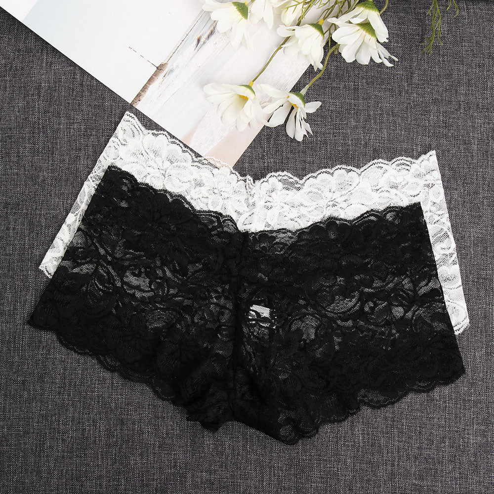 Black high-waist cotton thong with lace trim, elegant minimalist design for chic outfits