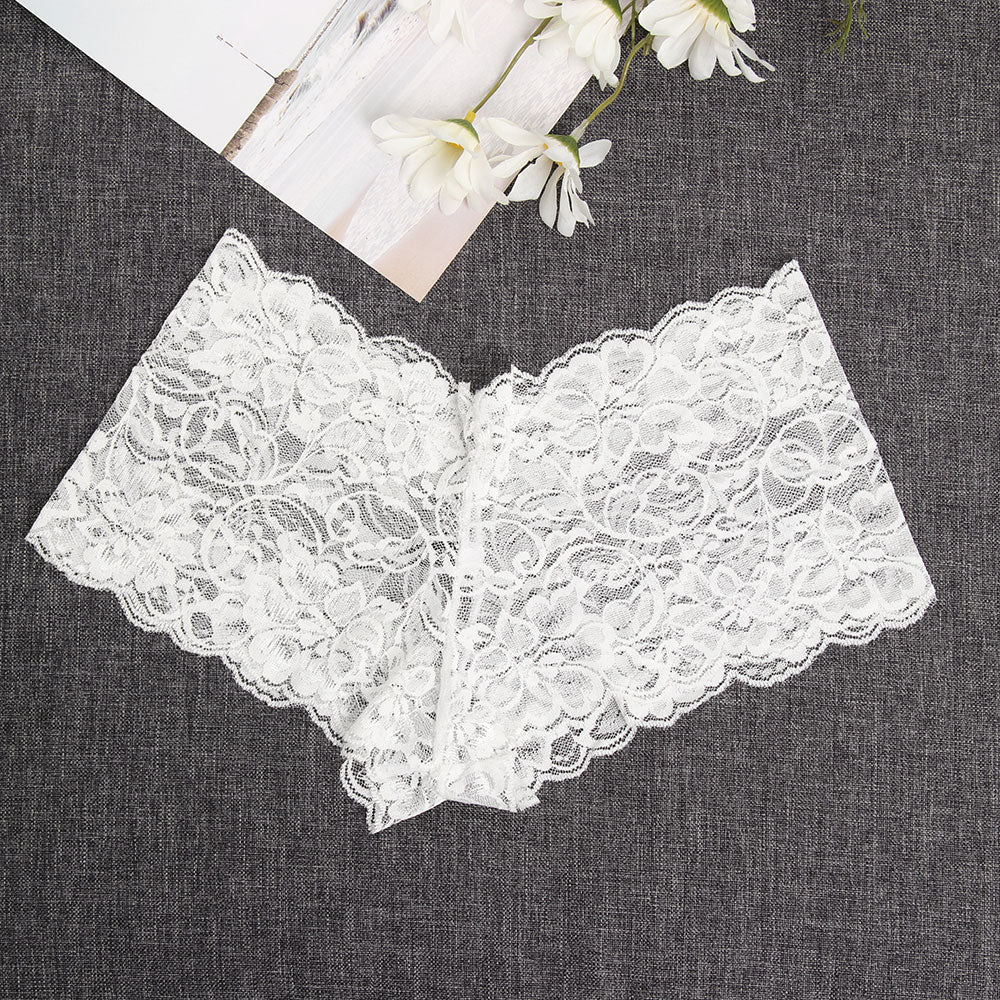 White high-waist thong featuring a delicate lace design, perfect for a minimalist capsule wardrobe