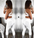 Lifestyle view of white high-waist leggings, showcasing a sporty design in a casual setting.