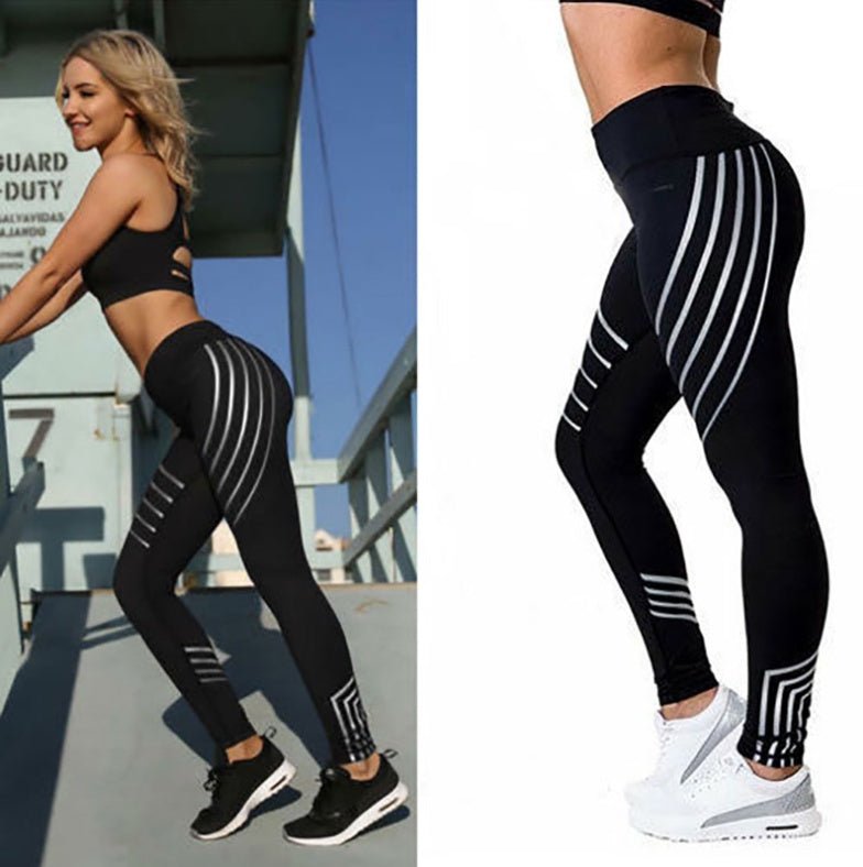 Side view of black high-waist leggings with a striped pattern, emphasizing the sporty aesthetic.