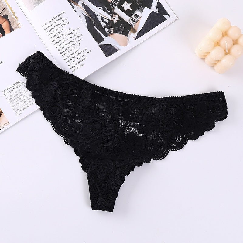 Close-up of black jacquard lace mesh briefs showcasing lace design and ruffled edges.