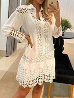 Lifestyle view of a white casual shirt with lace details and lantern sleeves, perfect for a capsule wardrobe @Black#White