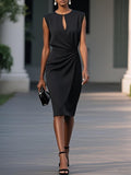 Lifestyle shot of a black midi dress showcasing a cross front and knotted design, elegant and versatile for any event.