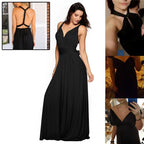 Long black bandage maxi dress with v-neck and open back in a lifestyle shot, showcasing chic minimalist style.