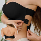 Side view of the black strapless tube bra featuring a cross side buckle for adjustable fit, elegant design