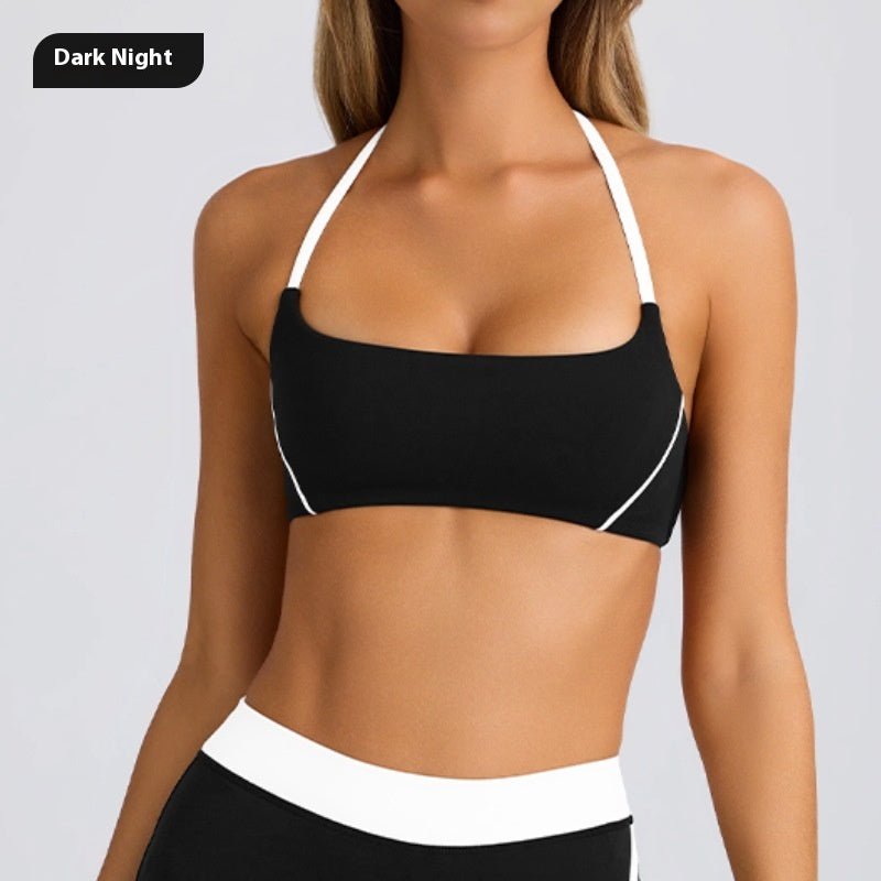 Front view of the black sports bra with halter neck, chic minimalist design @Black#White