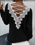 Back view of the black backless sweater featuring a lace-up design and long sleeves.