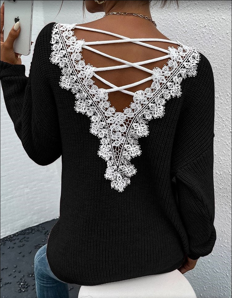 Back view of the black backless sweater featuring a lace-up design and long sleeves.